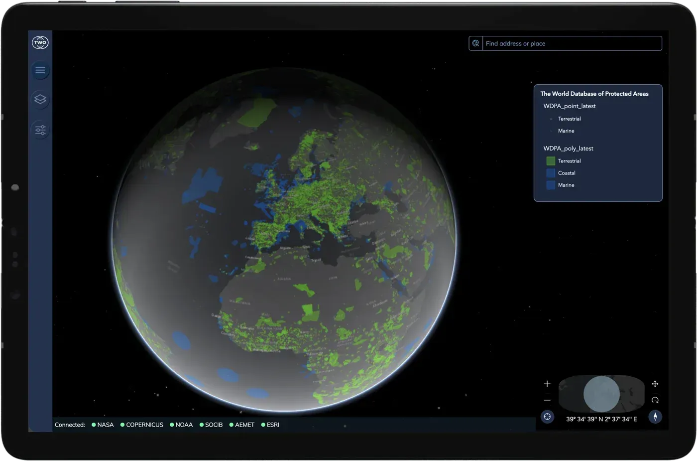 Atlas en una tableta con las áreas protegidas del mundo